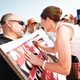 Michele Bachmann signs an autograph at a rally in August in South Carolina.(Richard Ellis/Getty Images)